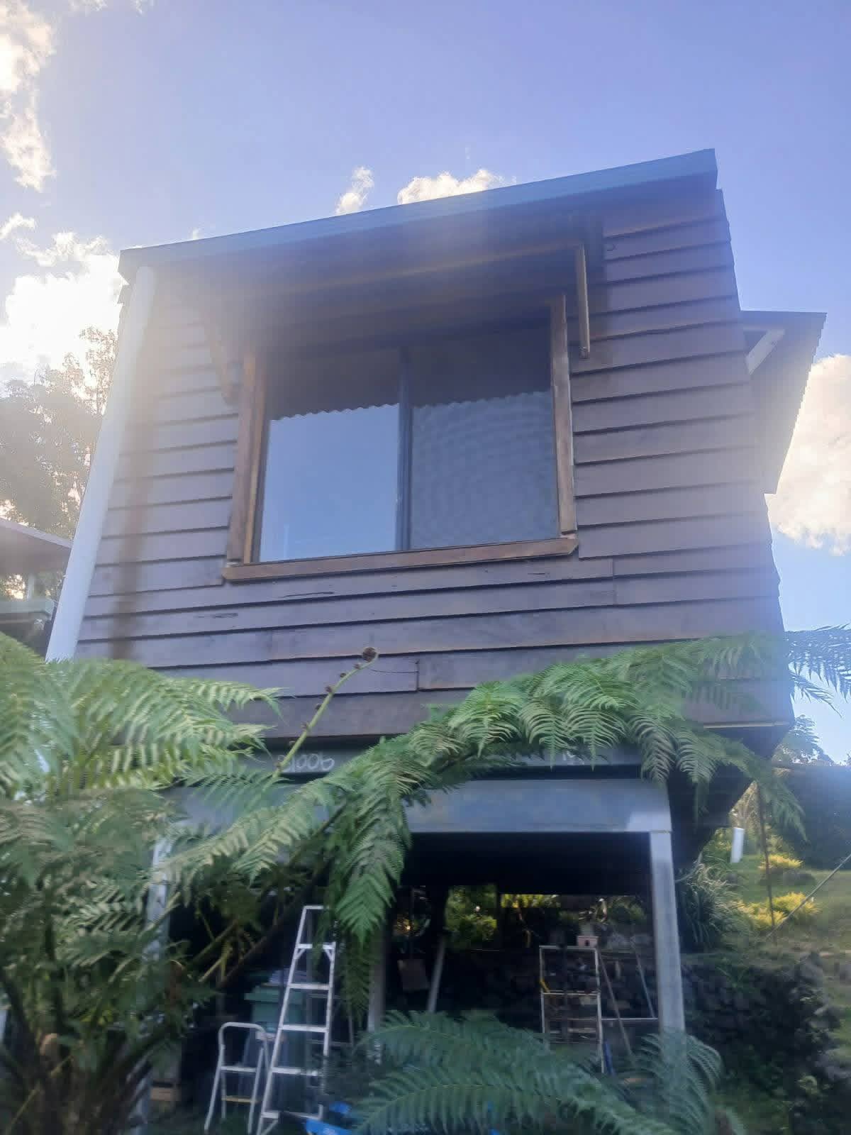 Professional exterior house painting on weatherboard home in Brunswick Heads NSW